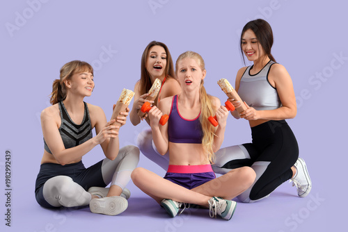 Sporty young women with don...