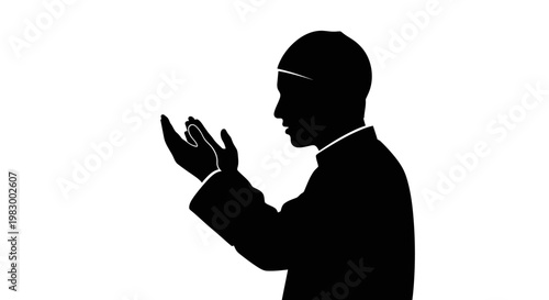 Silhouette of a Muslim man praying with hands raised in devotion.