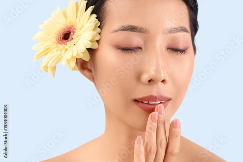 Beautiful Asian woman with ...