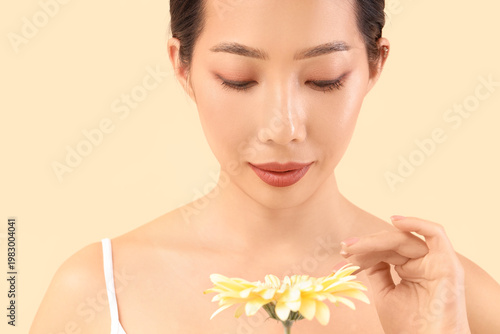 Beautiful Asian woman with ...