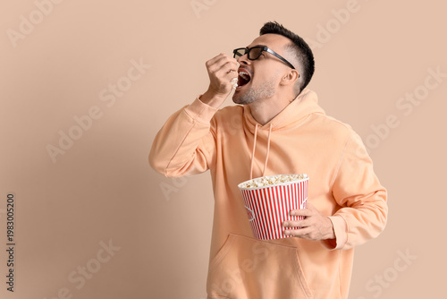 Happy young man in 3D glass...