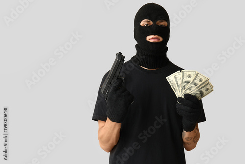 Male thief with dollar bank...