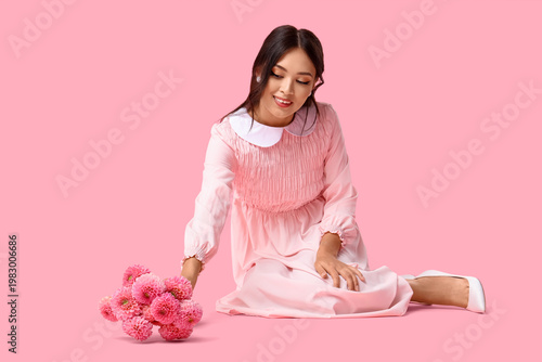 Beautiful young Asian woman...