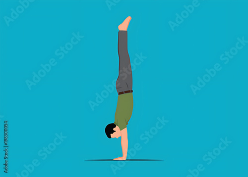 Man doing handstand on hands with legs up in air against blue background