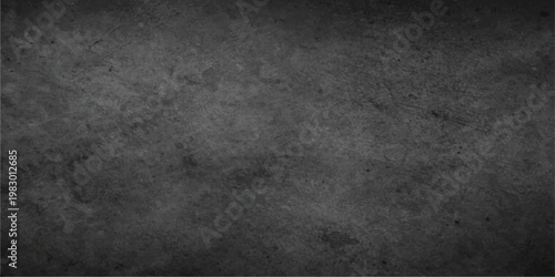 A dark and aged gray concrete wall texture featuring a dirty vintage grunge pattern on a rough stone surface backdrop