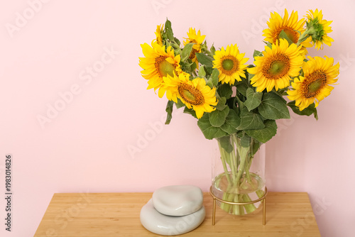 Vase with beautiful sunflow...