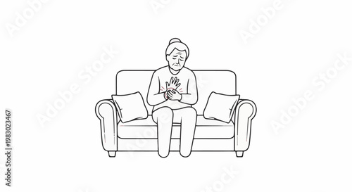 Elder on couch experiences chest pain, clutching chest with concern