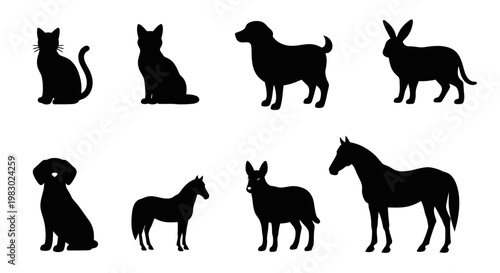 Collection of black domestic and pet animal silhouettes isolated on white background.