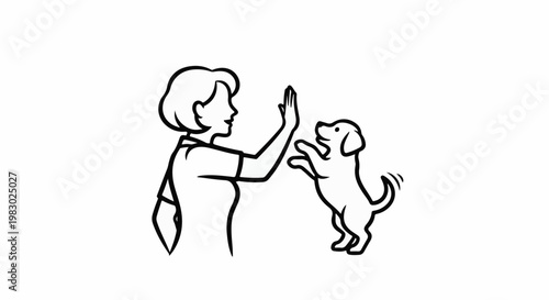 A person gives a high-five to a dog