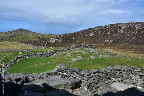 Landscape with Stone Walls Surrounding Fortress in Scotland