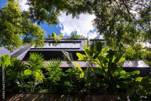 Modern Tropical House With Lush Green Garden