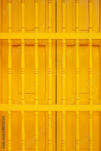 Yellow Wooden Door Symmetrical Pattern Close View