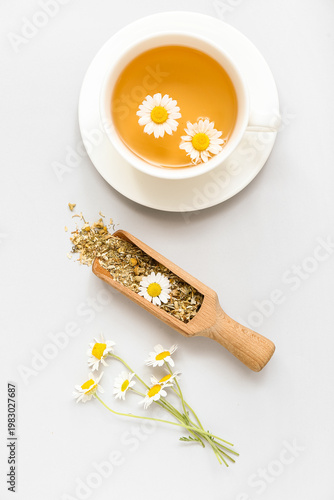 Cup of hot tea and scoop wi...