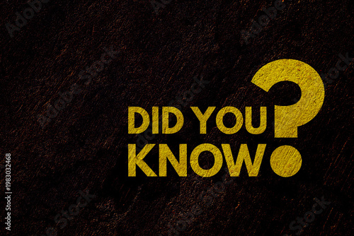 did you know and question mark painted on concrete wall