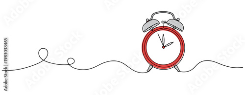Alarm clock standing on continuous line with white background