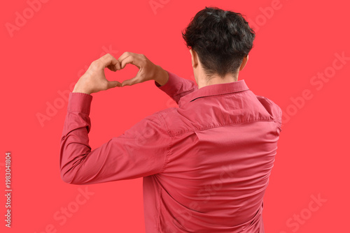 Handsome young man making h...