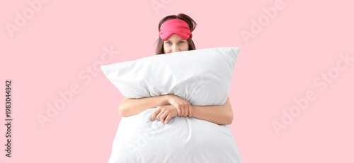 Young woman with sleeping m...