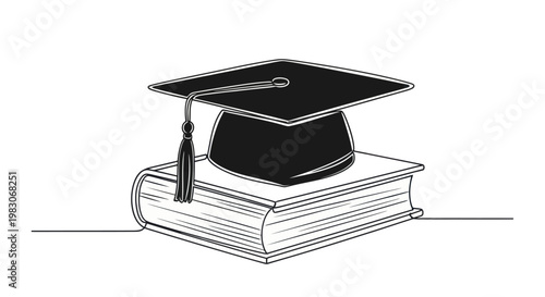 Graduation cap and book symbolizing academic achievement and future success.