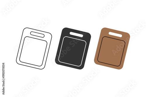 Set of three simple cutting boards in black, white, and brown.