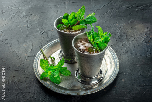 Mint Julep in the Kentucky Derby classic silver glass, with fresh mint leaves
