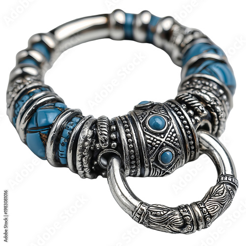 Ornate silver bracelet with turquoise accents and intricate detailed design