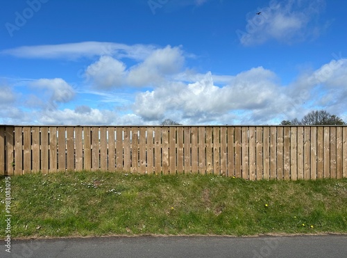 wooden fence by a road side