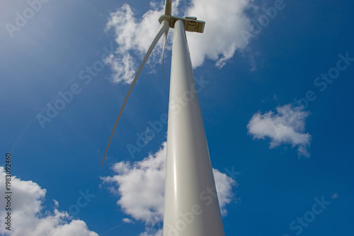 Technology in a blue cloudy sky in bright sunlight in springtime, Almere, Flevoland, The Netherlands, April 12, 2026