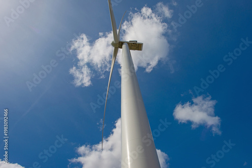 Technology in a blue cloudy sky in bright sunlight in springtime, Almere, Flevoland, The Netherlands, April 12, 2026