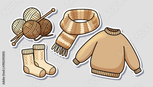 Warm beige knitted sweater, scarf, socks and yarn with knitting needles evoke cozy winter craft, handmade comfort and hygge-inspired home knitting hobby and wool fashion.