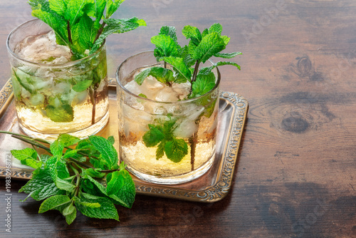Wallpaper Mural Mint Julep, the classic Kentucky Derby cocktail, with fresh mint and crushed ice, with copy space Torontodigital.ca