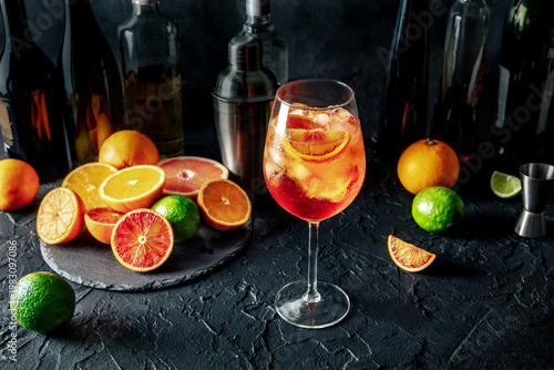 Wallpaper Mural Aperol Spritz, cocktail with oranges and sparkling wine, in a bar, with citrus fruits and bottles of alcohol Torontodigital.ca