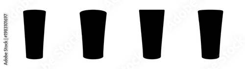 four empty black cylindrical glasses on white background minimalist composition