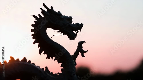 Dragon silhouette at sunset sky sculpture mythical statue profile against dusk horizon majestic myth fantasy ornate carving horizon glow evening atmosphere