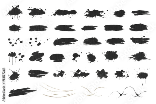 A versatile set of black ink splatters, artistic brush strokes, and textured paint blots on a white background. This collection features a variety of shapes, including drips, smudges, and fine line 