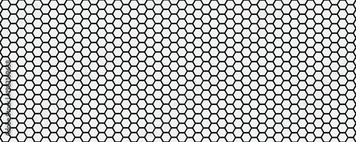 Black seamless hexagon pattern. Repeating honeycomb texture background. Geometric hexagonal halftone tech overlay backdrop. Abstract repeated hex texture. Vector retro technology dot wallpaper