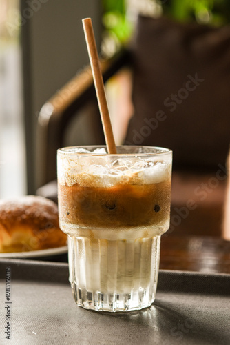 glass of iced cafe with recycle straw 