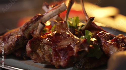 Fresh Grilled Lamb Steak on a Plate in Restaurant in a Warm Light. Chef is Serving Roasted Lamb Meat with Vegetables.