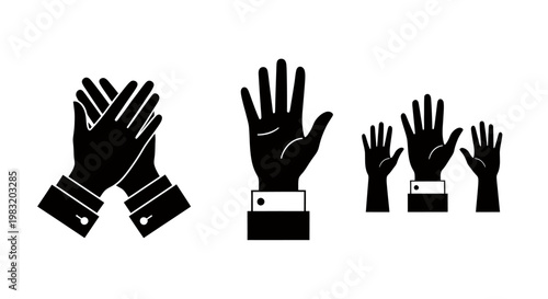 Group of raised hands and clapping silhouettes celebrating in a crowd.