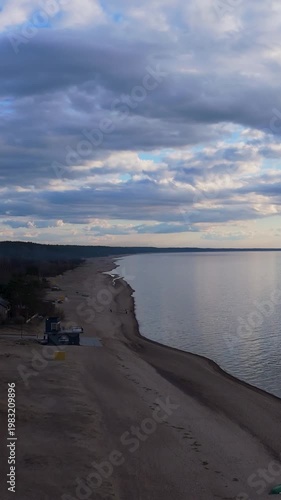 Peaceful Evening At Saulkrasti Beach Before Sunset With Calm Baltic Sea, Soft Pastel Sky, Gentle Waves, And Tranquil Spring Atmosphere Creating Relaxing Coastal Landscape Footage