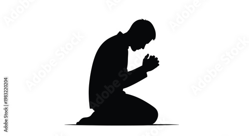 Silhouette of a man kneeling in prayer hands clasped together