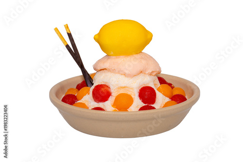 A refreshing bowl of fruit bingsu featuring shaved ice, melon and watermelon scoops, topped with a lemon-shaped dessert and Pocky.