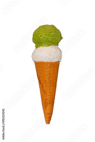 A two-scoop ice cream cone featuring a green matcha top and a white vanilla base nestled in a waffle cone.