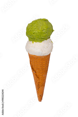 A two-scoop ice cream cone featuring a green matcha top and a white vanilla base nestled in a waffle cone.