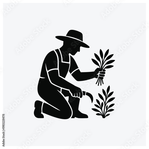 Silhouette of a farmer harvesting vegetables, kneeling and holding a bundle.