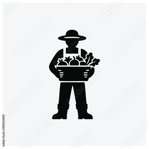Silhouette of farmer holding basket of vegetables