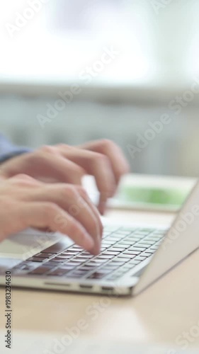Close up of Hands Typing on Laptop, vertical video