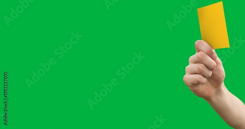 Right hand entering right edge, holding yellow card, tilting settling presenting on transparent bg