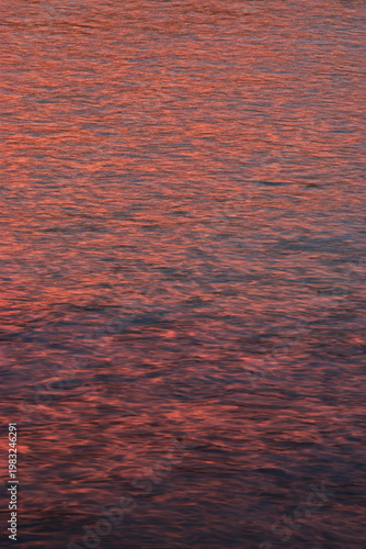 Sunset colors reflected in water