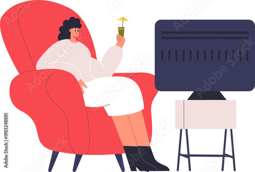 Woman relaxing in armchair watching television and enjoying a drink
