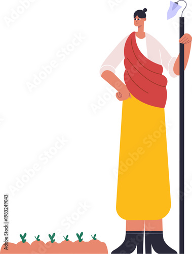 Gardener holding a hoe, supervising small plant sprouts in the soil